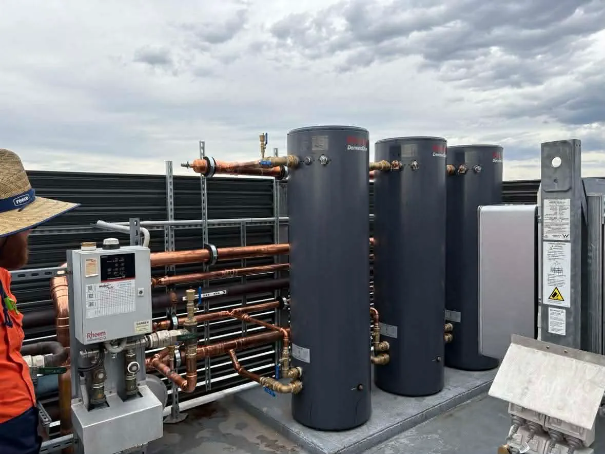 Commercial hot water system with Rheem storage tanks and copper pipework installed by Water Tight Commercial